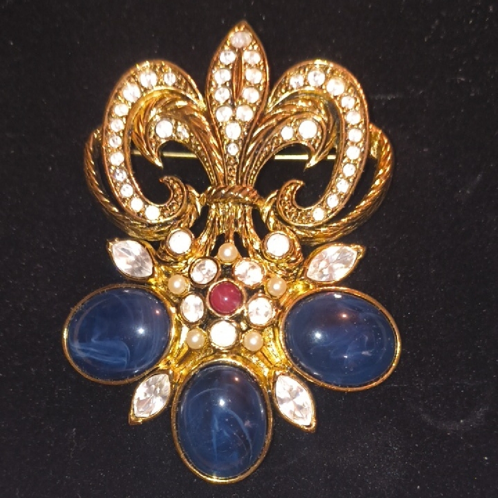 Elegant Gold and Blue Brooch